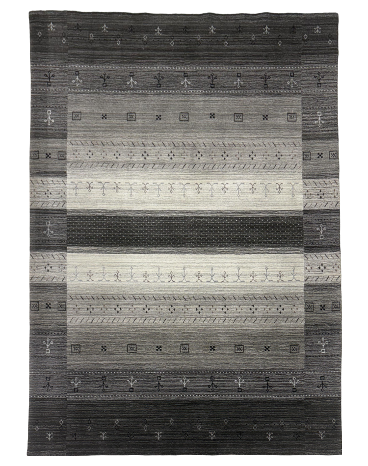 Modern gray and charcoal striped carpet in a wool and viscose blend, perfect for sophisticated interiors.