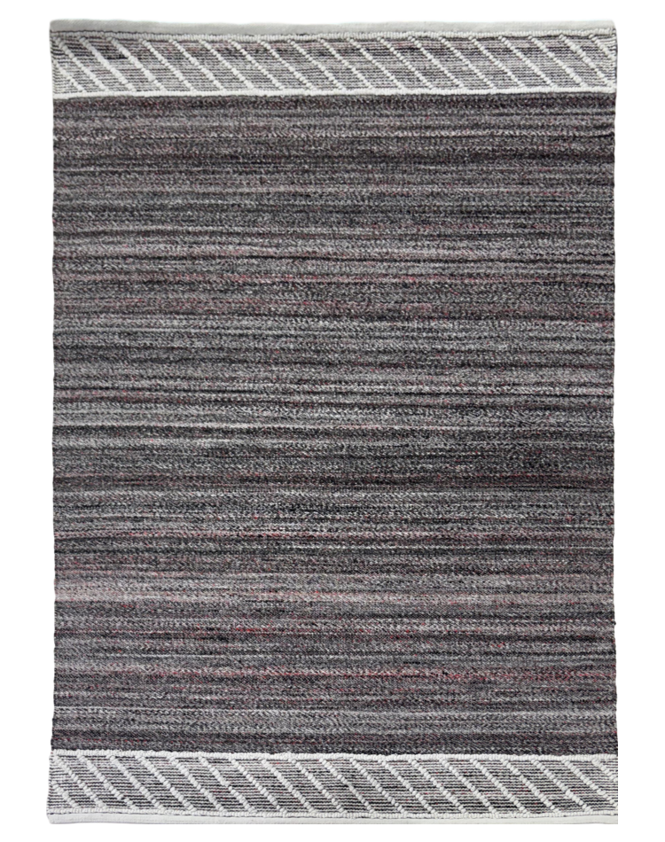 Modern flat weave carpet with charcoal red stripes in a soft wool and cotton blend, ideal for contemporary spaces.