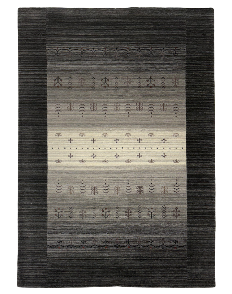 Transitional striped carpet in gradient shades of gray with a wool and viscose blend