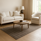 Brown flat weave carpet with a modern checker pattern, suitable for various interior spaces.