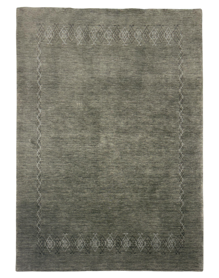 Elegant transitional grey wool carpet with a subtle border design, perfect for modern and classic spaces.