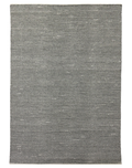 A modern flat weave carpet in a textured solid pattern, featuring a sophisticated gray color for elegant interiors.