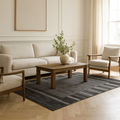 Loom knotted modern gray carpet with geometric pattern ideal for living rooms and offices.