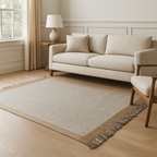 A modern flat weave wool carpet featuring a geometric pattern with sand, gray, and chocolate colors.