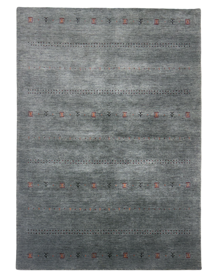 Transitional textured solid grey carpet made with loom knotting