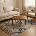 A modern flat weave wool carpet featuring a diamond lattice pattern in gray and charcoal.