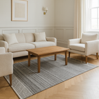 Gray and ivory modern stripe carpet on a marble floor, 5'5x8 ft, flat weave.