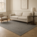 A modern geometric wool carpet in gray, measuring 5'5x8 ft, ideal for contemporary and elegant interiors.